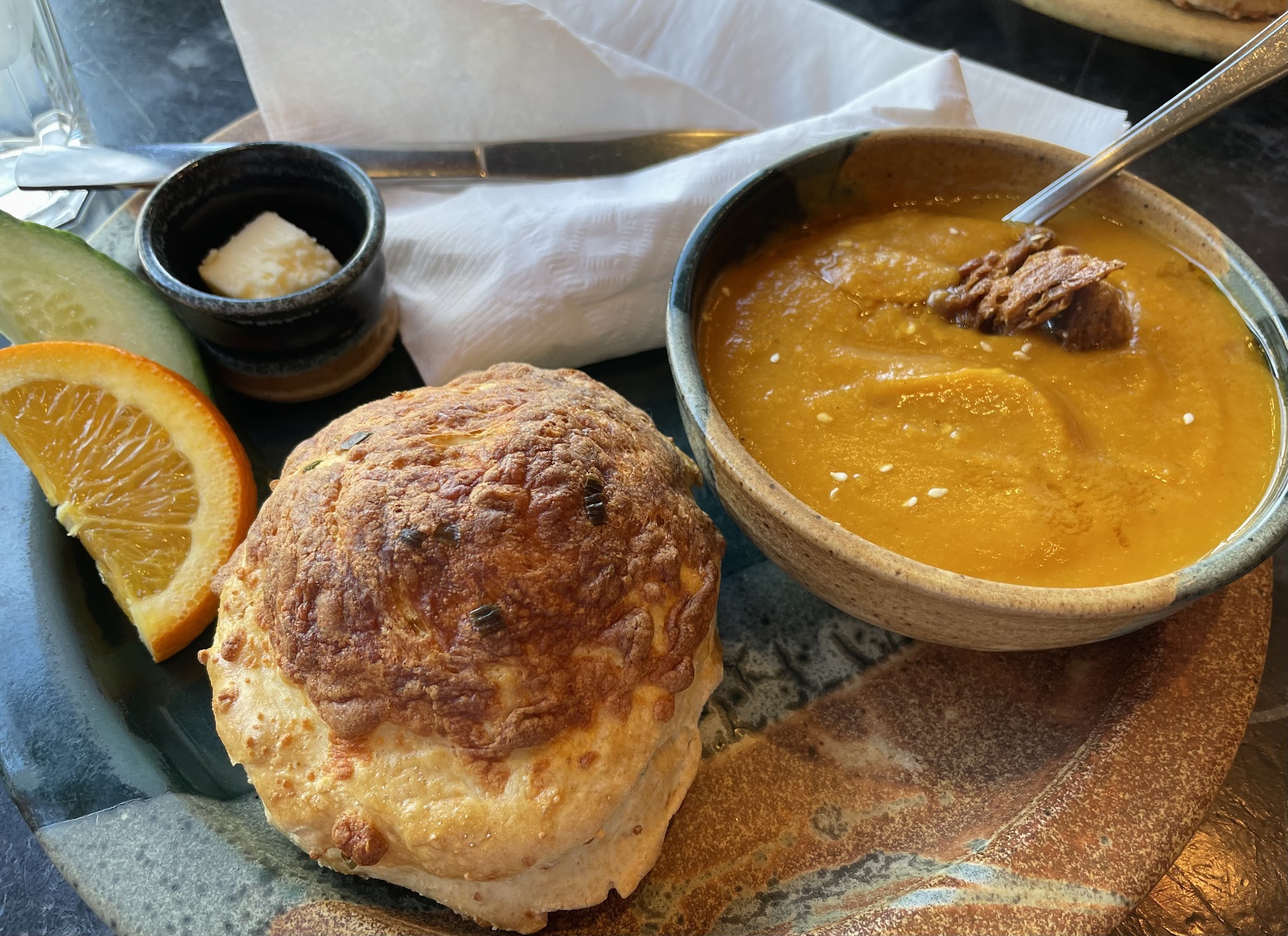 Cheese scone with soup and fresh fruit